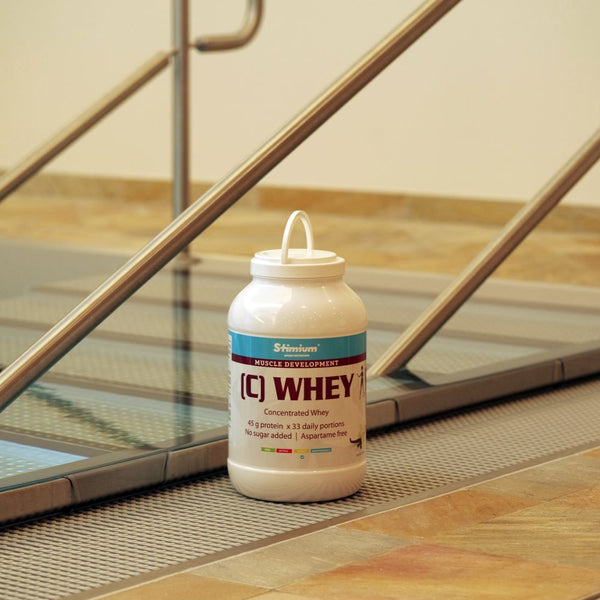 Stimium C Whey Vanille 2kg de proteine concentree WPC a 80%  81% pour construction musculaire et recuperation optimisee avec une parfaite solubilite sans grumeaux dans le shaker 